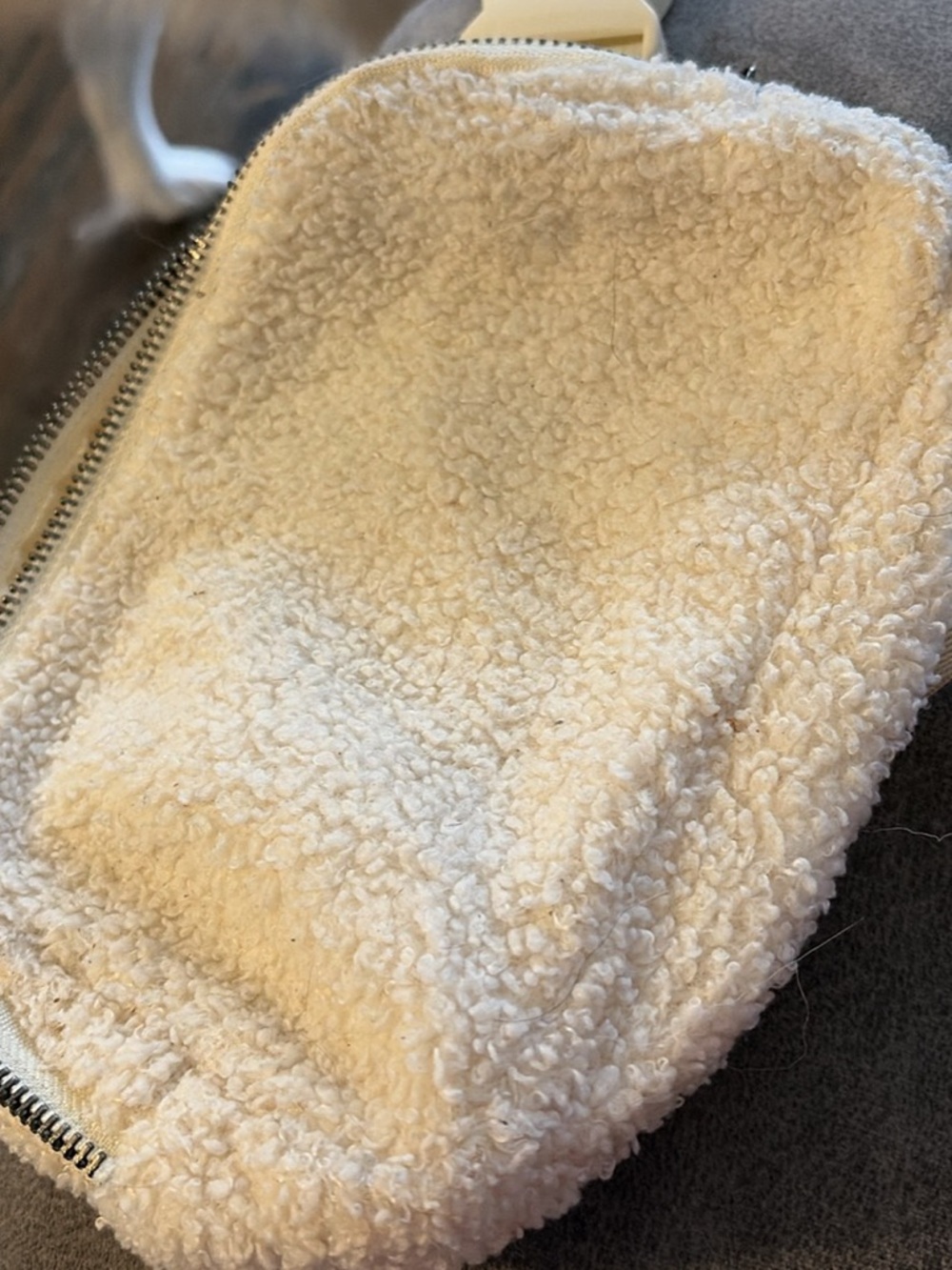 Women’s white faux wool belt bag